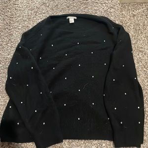 H&M size large fuzzy sweater. Black with rhinestones on it.